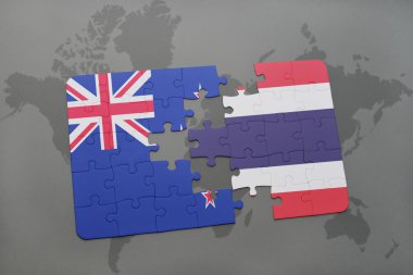 bir dünya haritası arka plan üzerinde Yeni Zelanda ve Tayland ulusal bayrağı ile bulmaca. 3d illüstrasyon