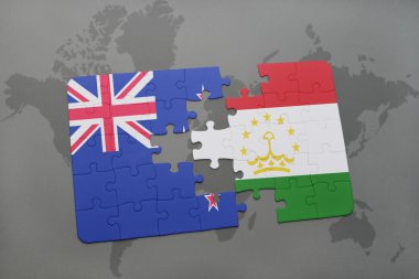 bir dünya haritası arka plan üzerinde Yeni Zelanda ve Tacikistan ulusal bayrağı ile bulmaca. 3d illüstrasyon