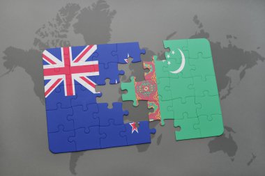 bir dünya haritası arka plan üzerinde Yeni Zelanda ve Türkmenistan ulusal bayrağı ile bulmaca. 3d illüstrasyon