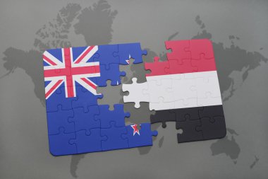bir dünya haritası arka plan üzerinde Yeni Zelanda ve Yemen ulusal bayrağı ile bulmaca. 3d illüstrasyon