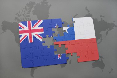bir dünya haritası arka plan üzerinde Yeni Zelanda ve Şili ulusal bayrağı ile bulmaca