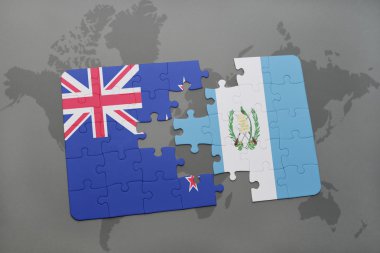 Dünya harita arka plan üzerinde Yeni Zelanda ve guatemala bayrağı ulusal ile bulmaca. 3D çizim