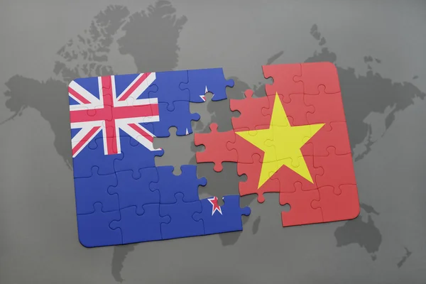 Puzzle with the national flag of new zealand and vietnam on a world map background. 3D illustration — Stock Photo, Image