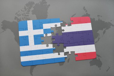 bir dünya haritası arka plan üzerinde Yunanistan ve Tayland ulusal bayrağı ile bulmaca.