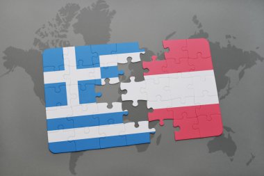 bir dünya haritası arka plan üzerinde Yunanistan ve Avusturya ulusal bayrağı ile bulmaca.