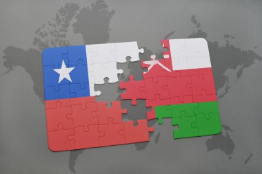 bir dünya haritası arka plan üzerinde şili ve umman ulusal bayrağı ile bulmaca.