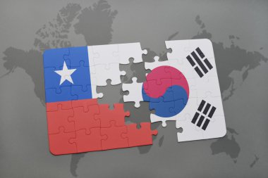 bir dünya haritası arka plan üzerinde şili ve güney kore ulusal bayrağı ile bulmaca.