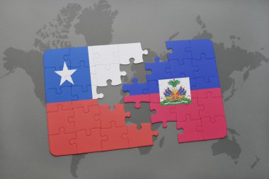 bir dünya haritası arka plan üzerinde şili ve haiti ulusal bayrağı ile bulmaca.