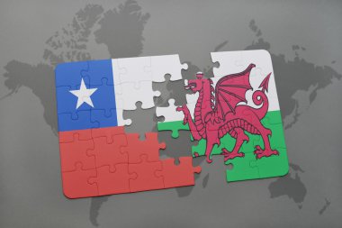 bir dünya haritası arka plan üzerinde şili ve galler ulusal bayrağı ile bulmaca.