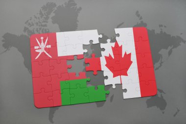 bir dünya haritası arka plan üzerinde umman ve Kanada ulusal bayrağı ile bulmaca.