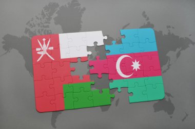 Umman ve Azerbaycan ulusal bayrak dünya harita arka plan üzerinde ile bulmaca.