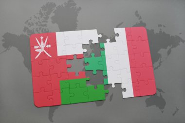 Umman ve İtalya'nın ulusal bayrak dünya harita arka plan üzerinde ile bulmaca.