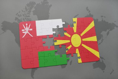 Umman ve Makedonya dünya harita arka plan üzerinde bayrağı ile bulmaca.