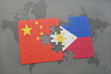 bir dünya haritası arka plan üzerinde Çin ve Filipinler ulusal bayrağı ile bulmaca.