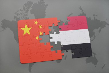 bir dünya haritası arka plan üzerinde Çin ve Yemen ulusal bayrağı ile bulmaca.