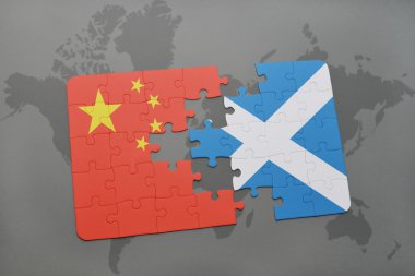 Dünya harita arka plan üzerinde Çin ve İskoçya Ulusal bayrakla bulmaca.