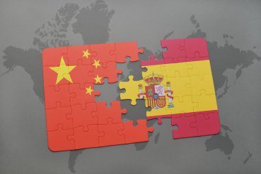 Dünya harita arka plan üzerinde Çin ve İspanya Ulusal bayrakla bulmaca.