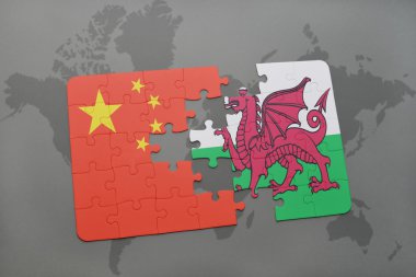 Çin ve dünya harita arka plan üzerinde Galler Ulusal bayrak ile bulmaca.