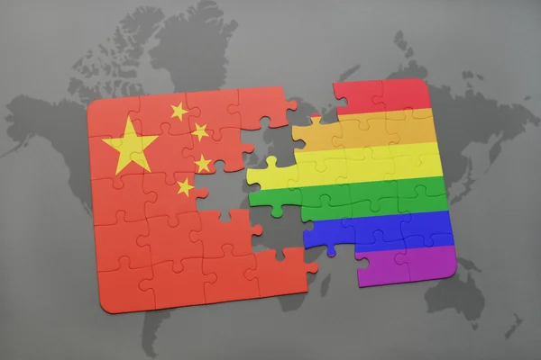 Puzzle with the national flag of china and gay rainbow flag on a world map background. — Stock Photo, Image