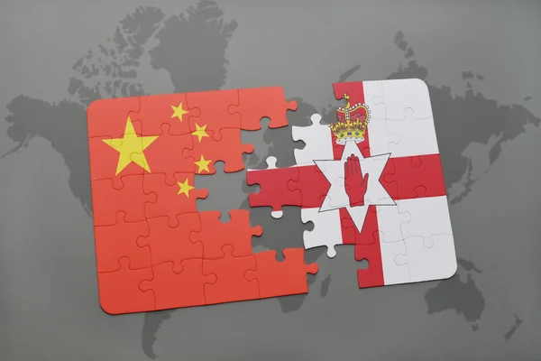 puzzle with the national flag of china and northern ireland on a world map background.