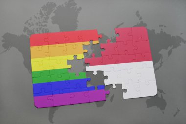bir dünya haritası arka plan üzerinde endonezya ve eşcinsel gökkuşağı bayrağı ulusal bayrağı ile bulmaca.