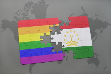 tacikistan ulusal bayrağı ve bir dünya haritası arka plan üzerinde eşcinsel gökkuşağı bayrağı ile bulmaca.