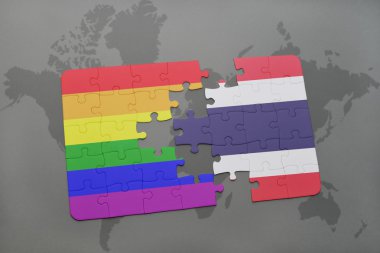 bir dünya haritası arka plan üzerinde tayland ve gay gökkuşağı bayrağı ulusal bayrağı ile bulmaca.