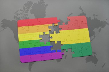 bir dünya haritası arka plan üzerinde bolivya ve eşcinsel gökkuşağı bayrağı ulusal bayrağı ile bulmaca.