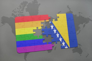 bir dünya haritası arka plan üzerinde bosna-hersek ve gay gökkuşağı bayrağı ulusal bayrağı ile bulmaca.