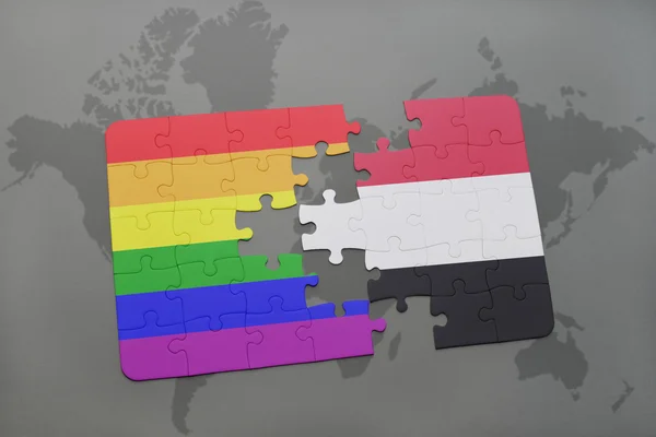 Puzzle with the national flag of yemen and gay rainbow flag on a world map background. — Stock Photo, Image