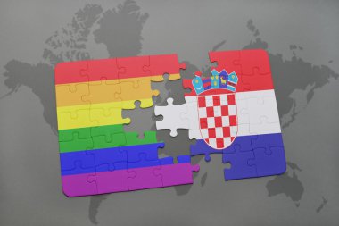 bir dünya haritası arka plan üzerinde hırvatistan ve gay gökkuşağı bayrağı ulusal bayrağı ile bulmaca.