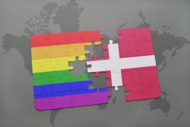 bir dünya haritası arka plan üzerinde Danimarka ve eşcinsel gökkuşağı bayrağı ulusal bayrağı ile bulmaca.