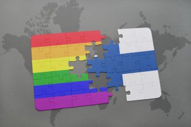 bir dünya haritası arka plan üzerinde finlandiya ve eşcinsel gökkuşağı bayrağı ulusal bayrağı ile bulmaca.