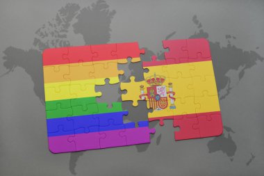 bir dünya haritası arka plan üzerinde İspanya ve eşcinsel gökkuşağı bayrağı ulusal bayrağı ile bulmaca.