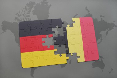bir dünya haritası arka plan üzerinde Almanya ve Belçika ulusal bayrağı ile bulmaca.