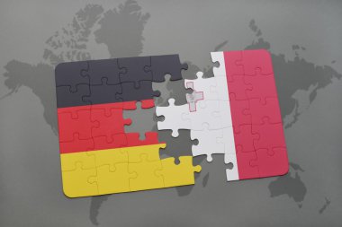 bir dünya haritası arka plan üzerinde Almanya ve Malta ulusal bayrağı ile bulmaca.