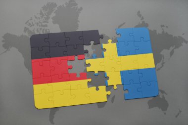 bir dünya haritası arka plan üzerinde Almanya ve İsveç ulusal bayrağı ile bulmaca.