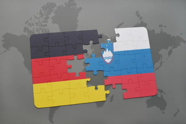 Головоломка з національним прапором Німеччини та Словенії на карті світу. — стокове фото