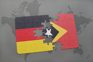 bir dünya haritası arka plan üzerinde Almanya ve Doğu timor ulusal bayrağı ile bulmaca.