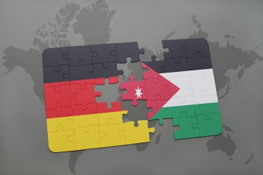 bir dünya haritası arka plan üzerinde Almanya ve Ürdün ulusal bayrağı ile bulmaca.