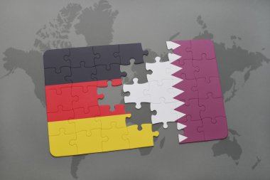 bir dünya haritası arka plan üzerinde Almanya ve Katar ulusal bayrağı ile bulmaca.