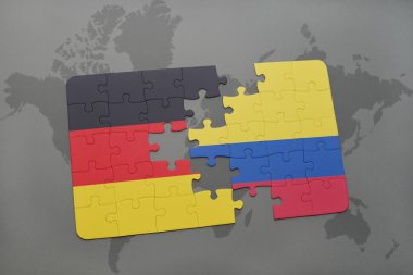 bir dünya haritası arka plan üzerinde Almanya ve Kolombiya ulusal bayrağı ile bulmaca.