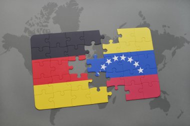 bir dünya haritası arka plan üzerinde Almanya ve Venezuela ulusal bayrağı ile bulmaca.