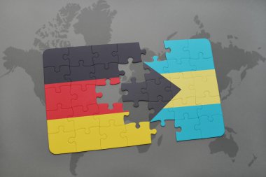 bir dünya haritası arka plan üzerinde Almanya ve Bahamalar ulusal bayrağı ile bulmaca.