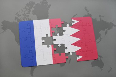bir dünya haritası arka plan üzerinde Fransa ve Bahreyn ulusal bayrağı ile bulmaca.