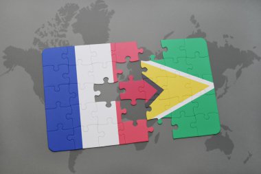 bir dünya haritası arka plan üzerinde Fransa ve guyana ulusal bayrağı ile bulmaca.