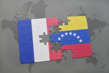 bir dünya haritası arka plan üzerinde Fransa ve Venezuela ulusal bayrağı ile bulmaca.