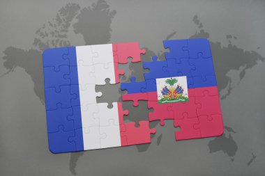 bir dünya haritası arka plan üzerinde Fransa ve Haiti ulusal bayrağı ile bulmaca.