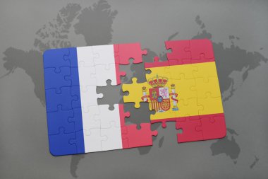 Fransa ve İspanya ulusal bayrak dünya harita arka plan üzerinde ile bulmaca.