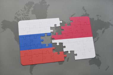 bir dünya haritası arka plan üzerinde Rusya ve Endonezya ulusal bayrağı ile bulmaca.
